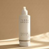 Terra Green moisturizer bottle on a beige background