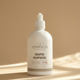 Bottle of Woodbury & Co. shampoo on a beige background