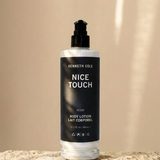 Kenneth Cole Nice Touch body lotion bottle on a beige background